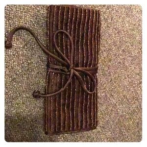 St. John beaded jewelry roll